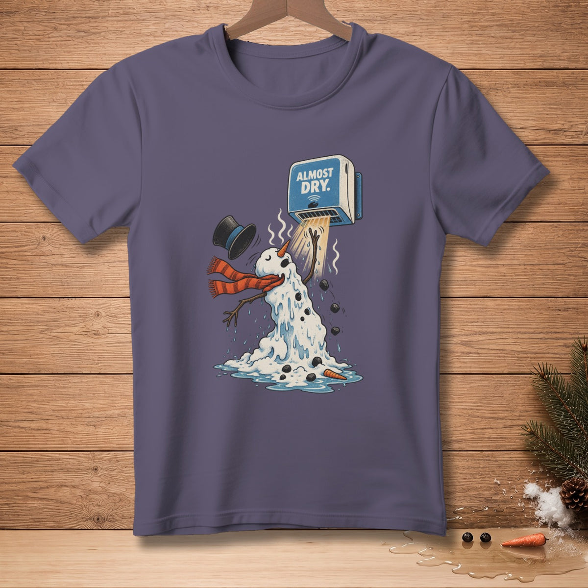 Melting snowman with scarf and hat under a hand dryer reading "Almost Dry."