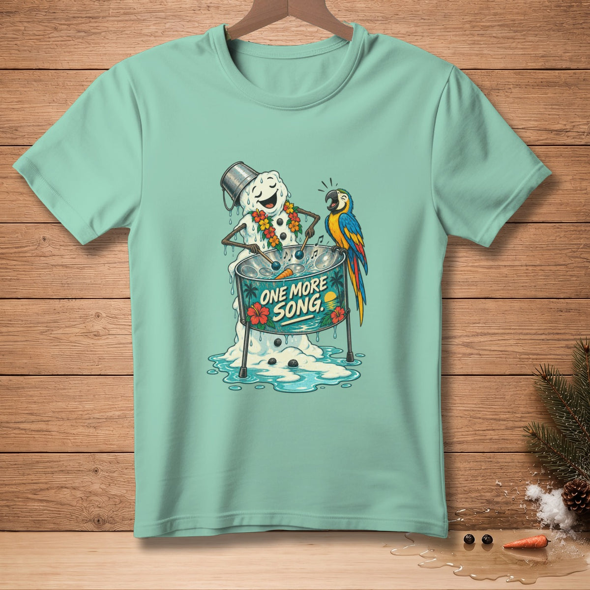 Melting snowman with a bucket on head plays steel drum with a parrot, text "ONE MORE SONG".