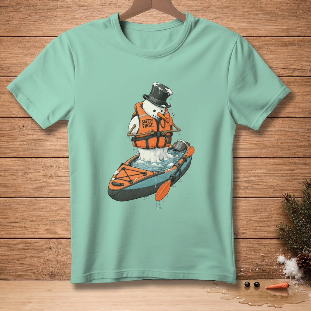 Snowman in a kayak wearing a life vest with "Safety First" text.