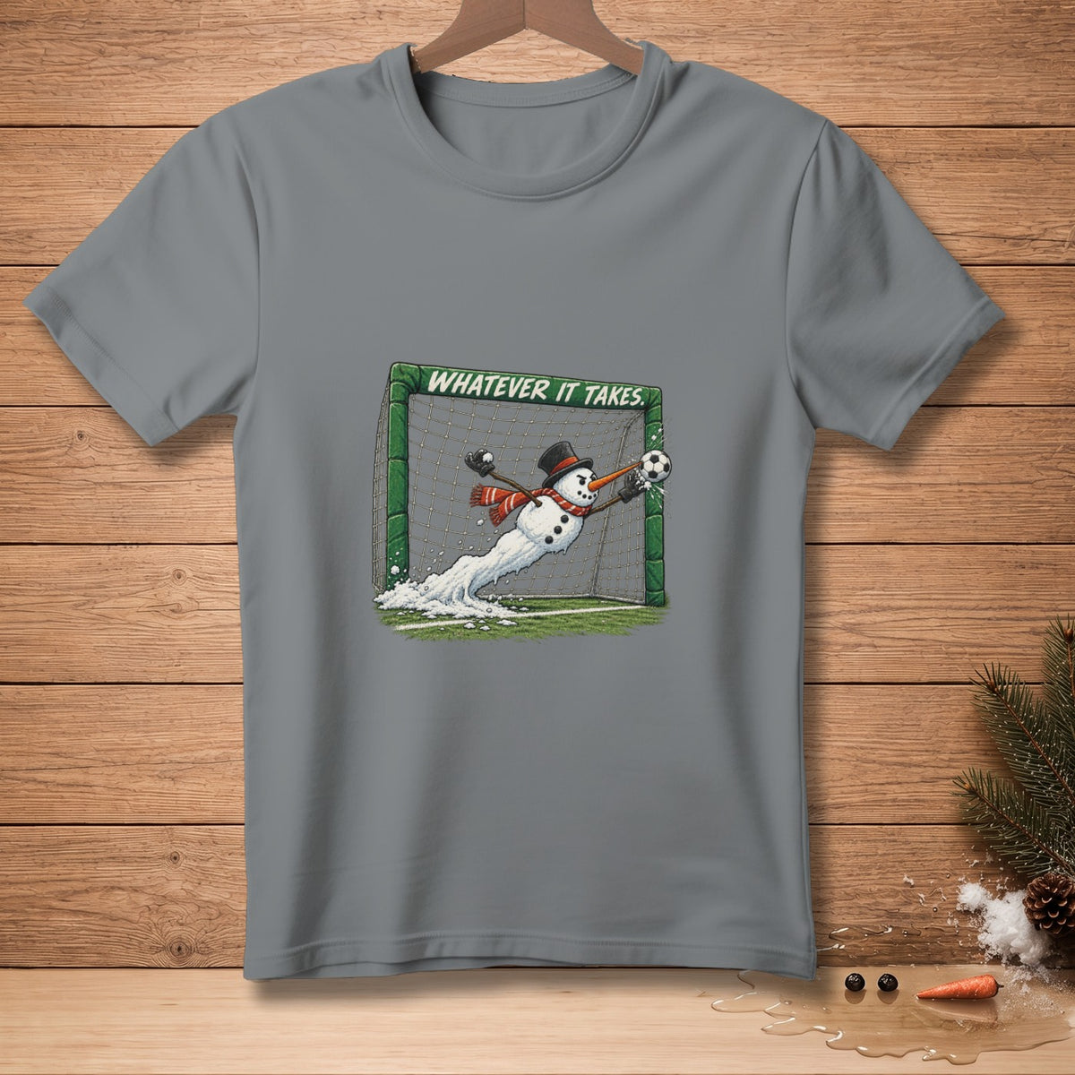 Snowman goalkeeper diving for a soccer ball, text "WHATEVER IT TAKES."