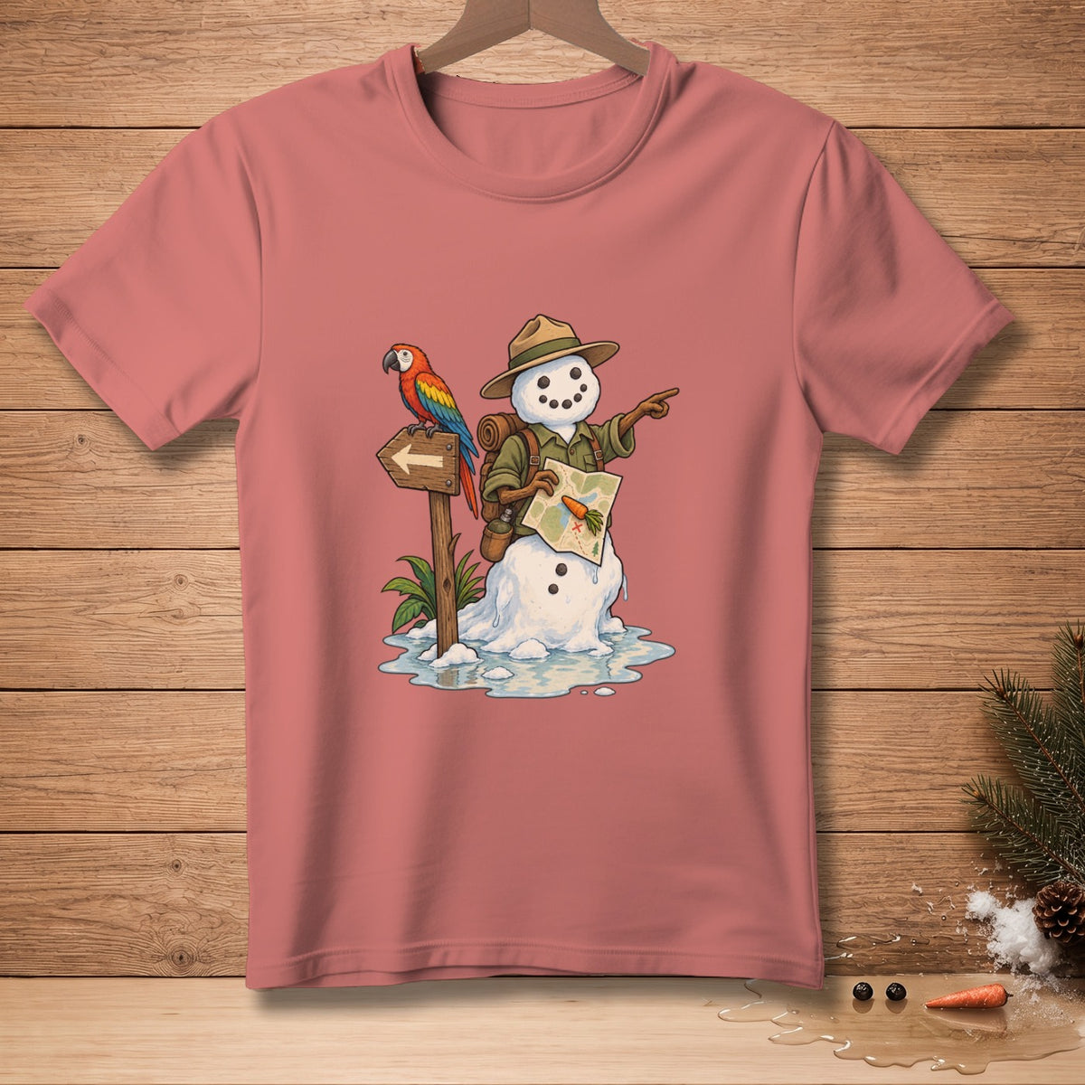 Snowman explorer with parrot on signpost holding a map, on a pink t-shirt.