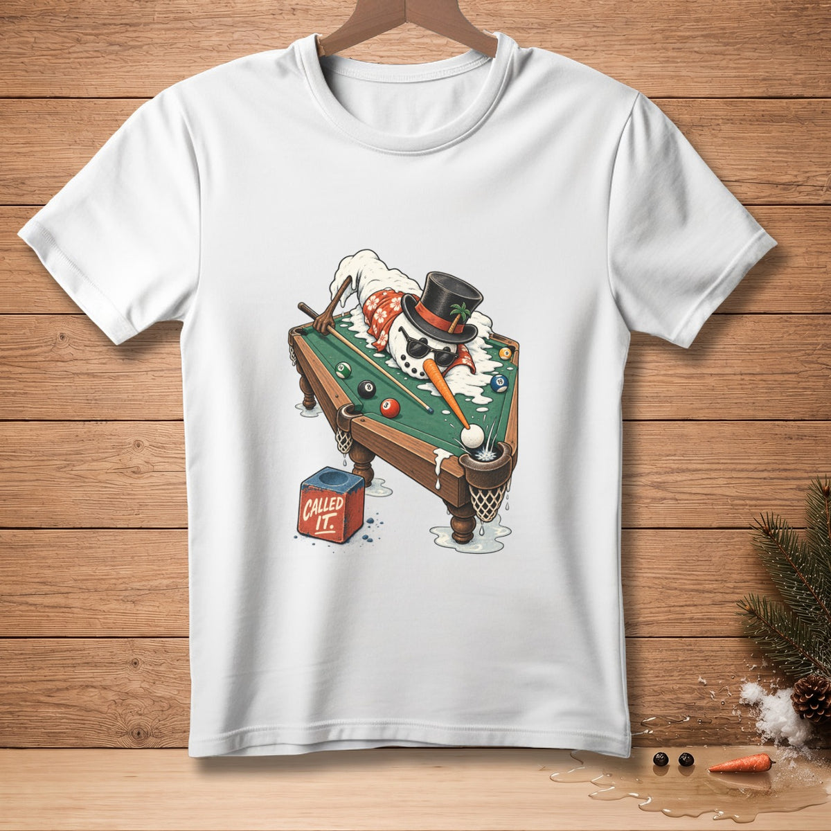 Snowman playing billiards with a chalk cube that says "CALLED IT."