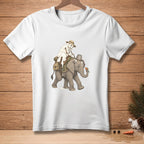A melting snowman rides a saddlebag-laden elephant eating a carrot.