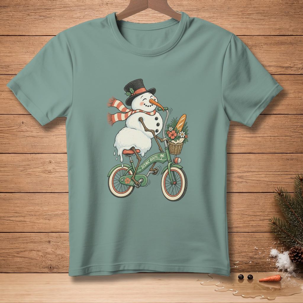 Snowman wearing a top hat and scarf rides a green bicycle with a flower basket.