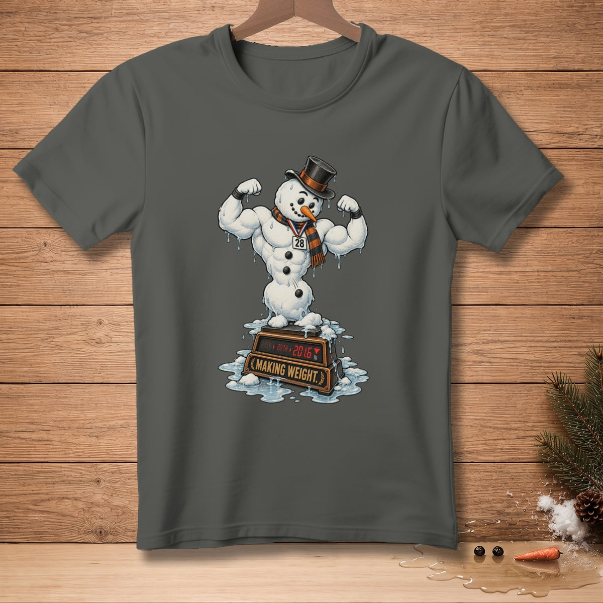 Muscular snowman wearing a top hat and medal, flexing on a scale reading "MAKING WEIGHT".