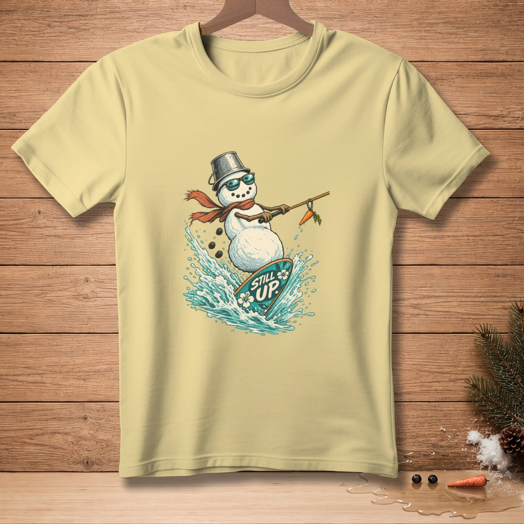 Snowman wearing sunglasses and scarf surfs a wave, holding carrot on a stick.