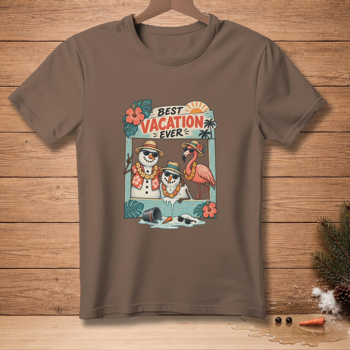 T-shirt graphic with snowmen and flamingo with text "BEST VACATION EVER".