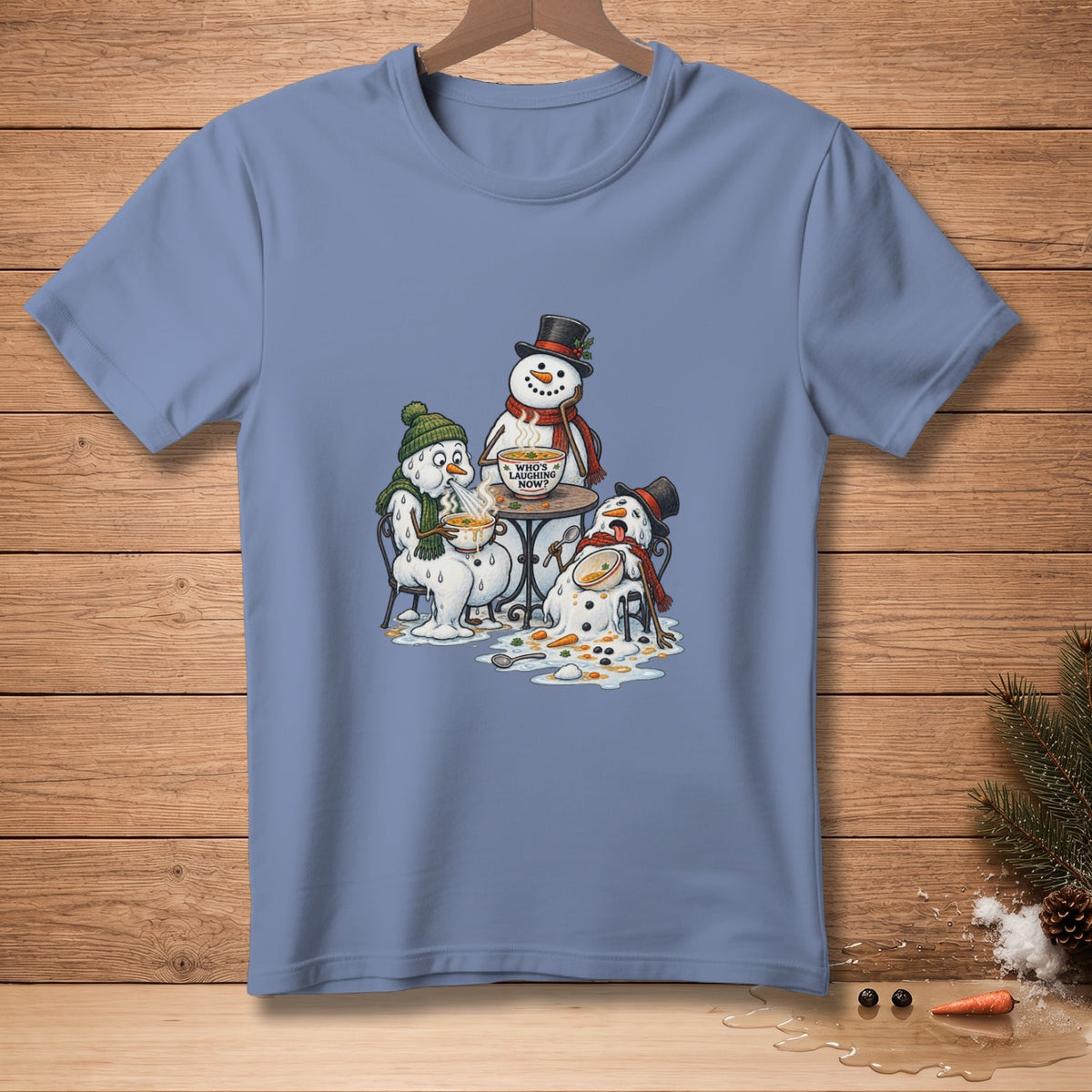 Melting snowmen eat soup at a table; one sign says "Who's Laughing Now?".