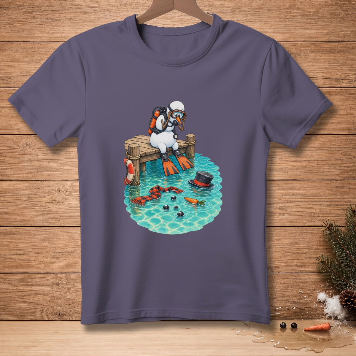 Diving snowman sitting on a dock with flippers, snorkel, and scuba gear.