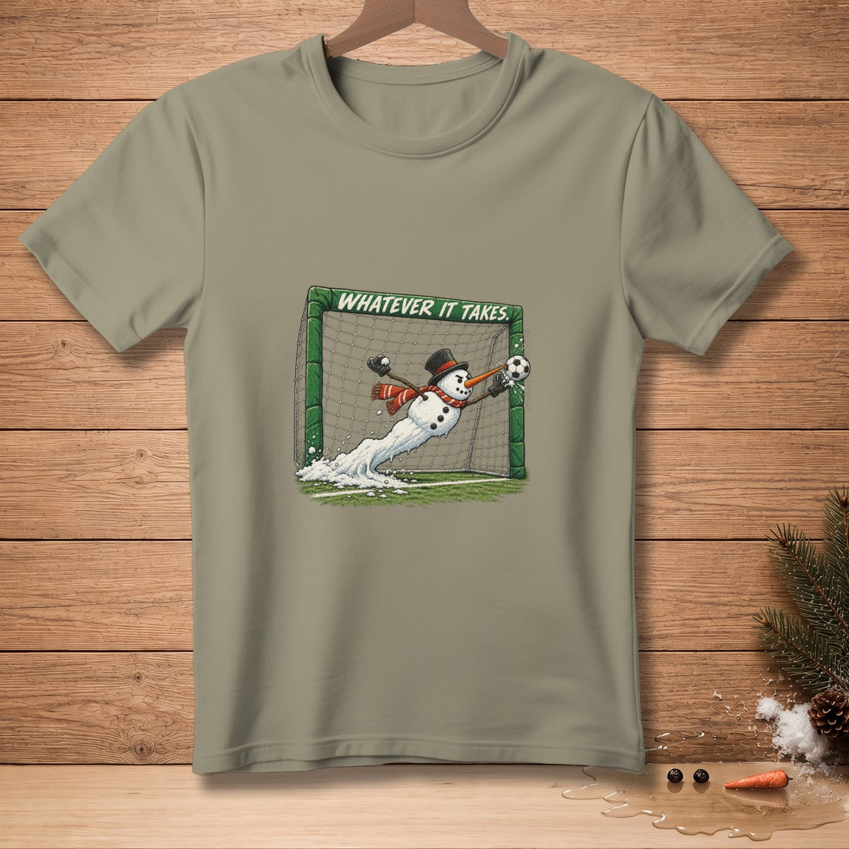 Snowman in a soccer goal dives to save a ball, text reads "WHATEVER IT TAKES."