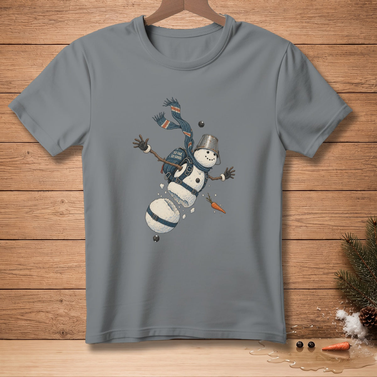 Grey t-shirt with a segmented snowman graphic with scarf, bucket hat, and text "SO FAR SO GOOD".