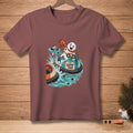 Snowman in bumper car with text "ROUND TWO." on a maroon t-shirt.