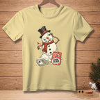 Snowman with googly eyes craft kit and glue on pale yellow t-shirt.