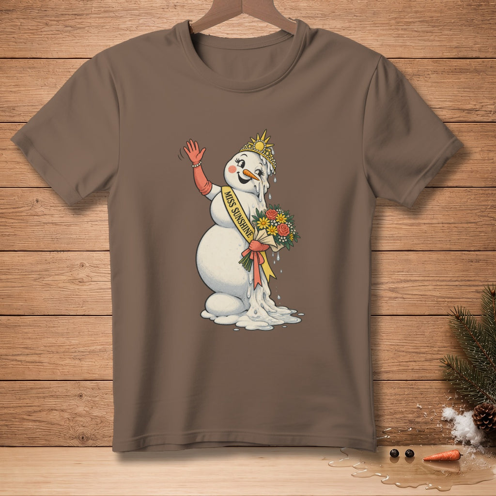 Melting snowman wearing a crown, sash that reads "Miss Sunshine," and holding a bouquet.