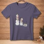 Three melting snowmen, Miss Winter, Miss Spring, and Miss July, on a t-shirt.