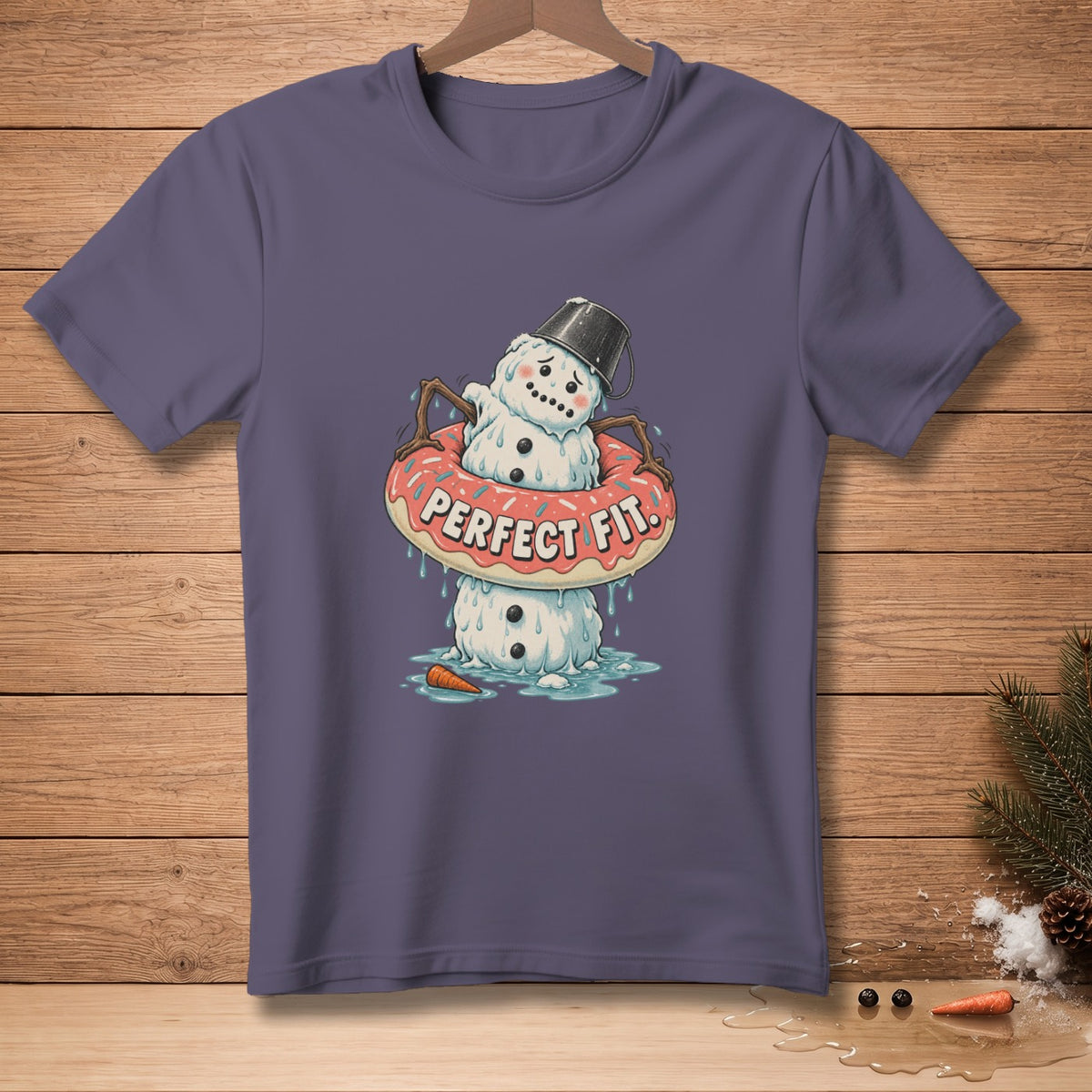Melting snowman with a bucket hat stuck in a donut saying "Perfect Fit".