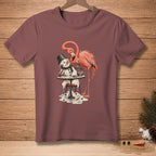 T-shirt with a flamingo offering a drink to a melting snowman at a table.