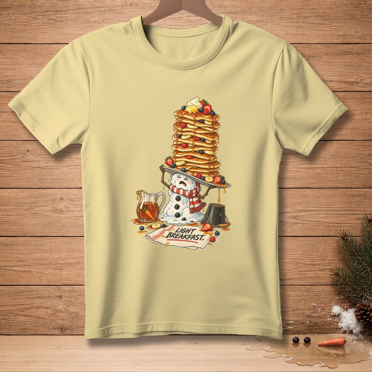 Snowman with a pancake tower, syrup, and text "Light Breakfast".