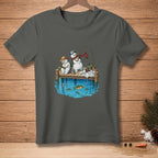 Two snowmen fishing on a pier with fish in the water.