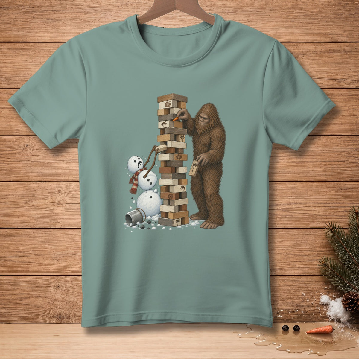 Bigfoot building a Jenga tower next to a falling snowman.