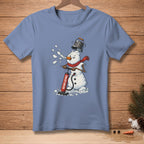 Snowman with carrot nose, scarf, and bucket head pumping an air pump labeled "REINFLATING."
