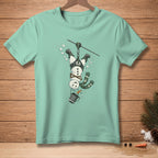 Snowman zip lining upside down with a bucket and carrot.