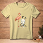 Light yellow t-shirt with a flamingo and a snowman doing a handstand graphic.