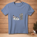 Elephant pulling snowmen with a rope, one snowman is using a carrot.