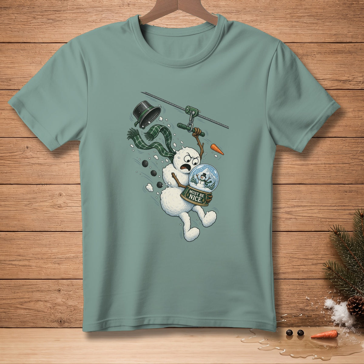 Snowman ziplining with a snow globe labeled "Must Be Nice."