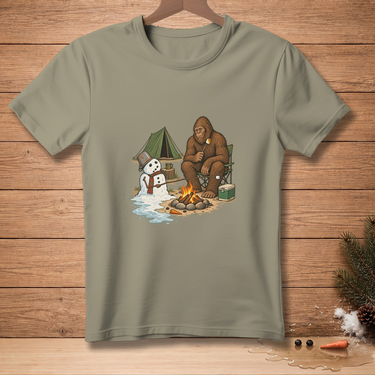 Bigfoot and a melting snowman camp by a campfire with a tent.