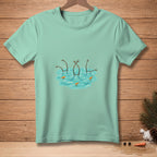 Teal t-shirt with a graphic of snowmen's arms and carrots in water.
