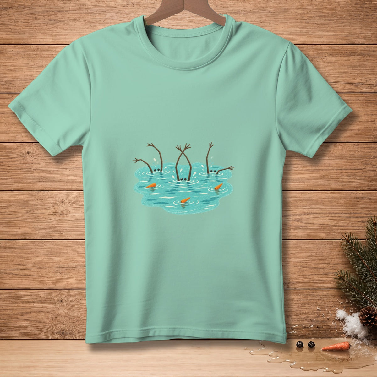 Teal t-shirt with a graphic of snowmen's arms and carrots in water.