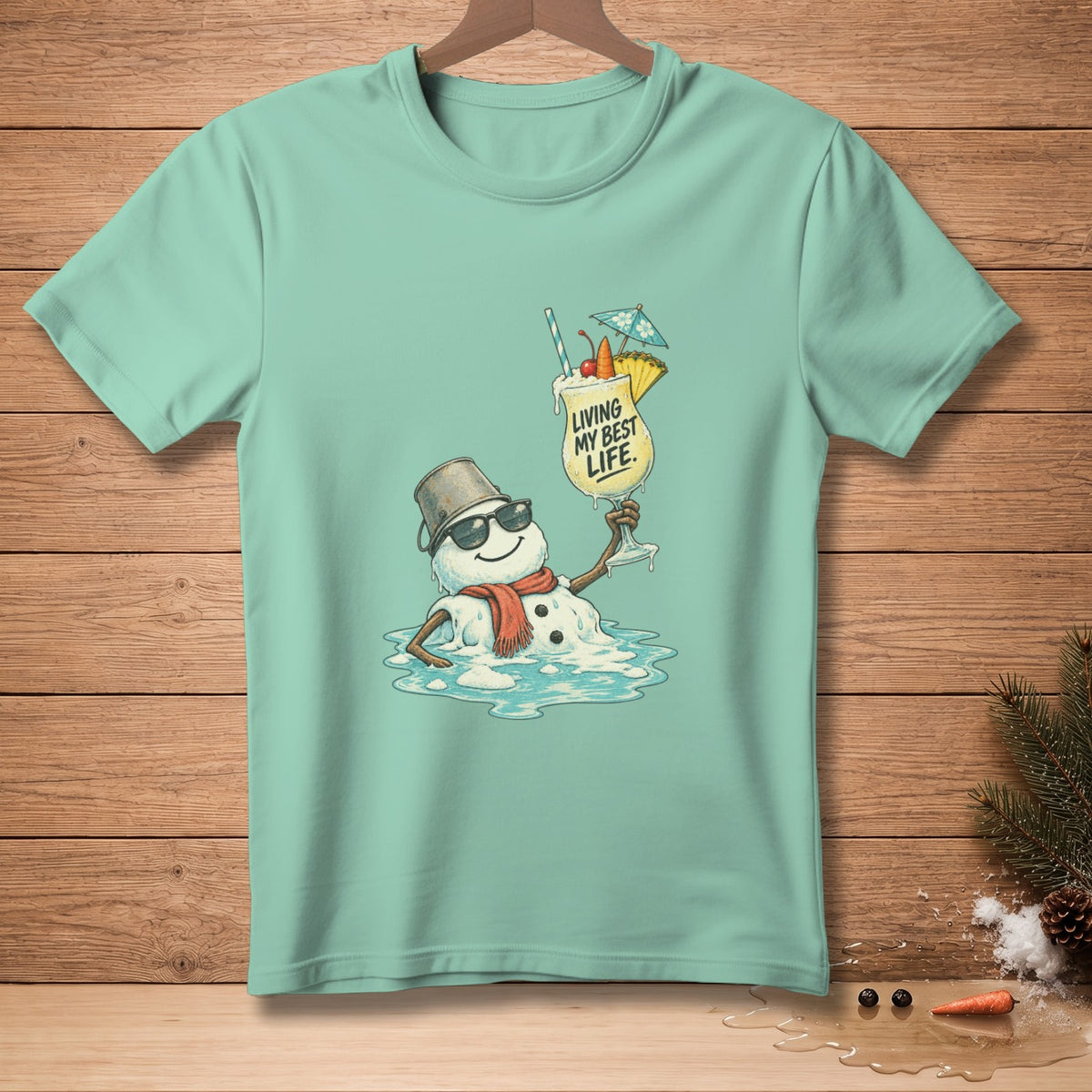 Melting snowman in sunglasses holding a tropical drink, text "Living My Best Life".