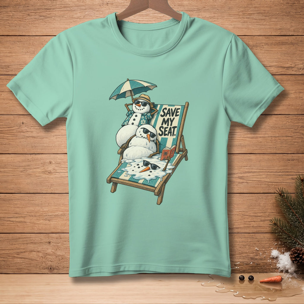 T-shirt graphic with snowmen melting on a beach chair with text "Save My Seat".