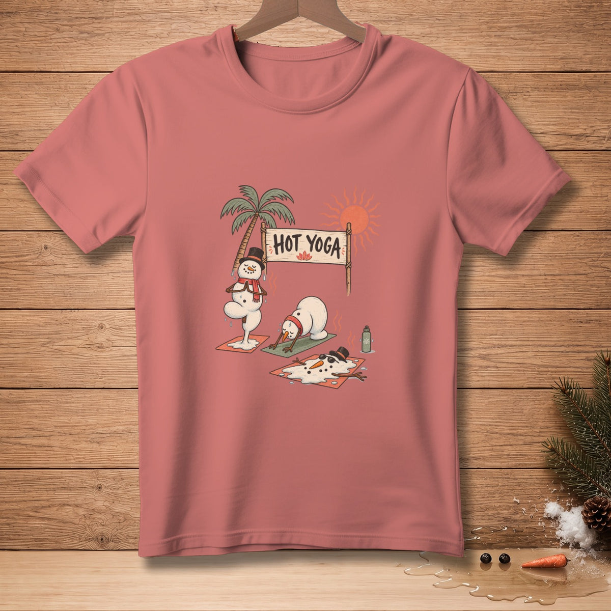 T-shirt with cartoon snowmen melting in hot yoga poses under a palm tree.