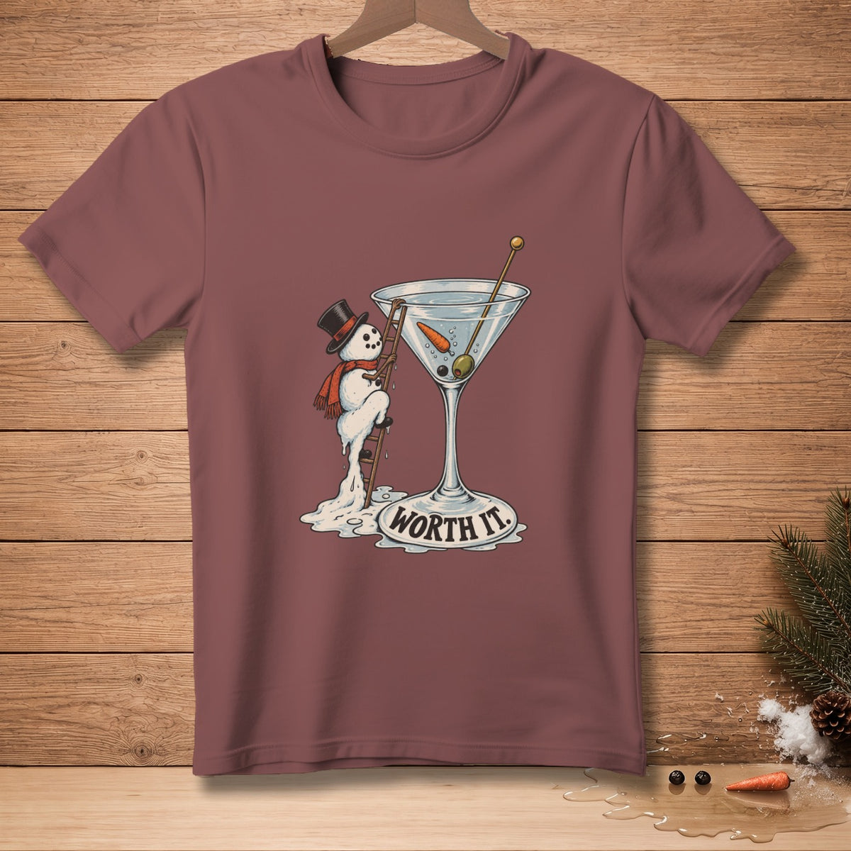 Snowman climbing a ladder into a martini glass with "Worth It" text.