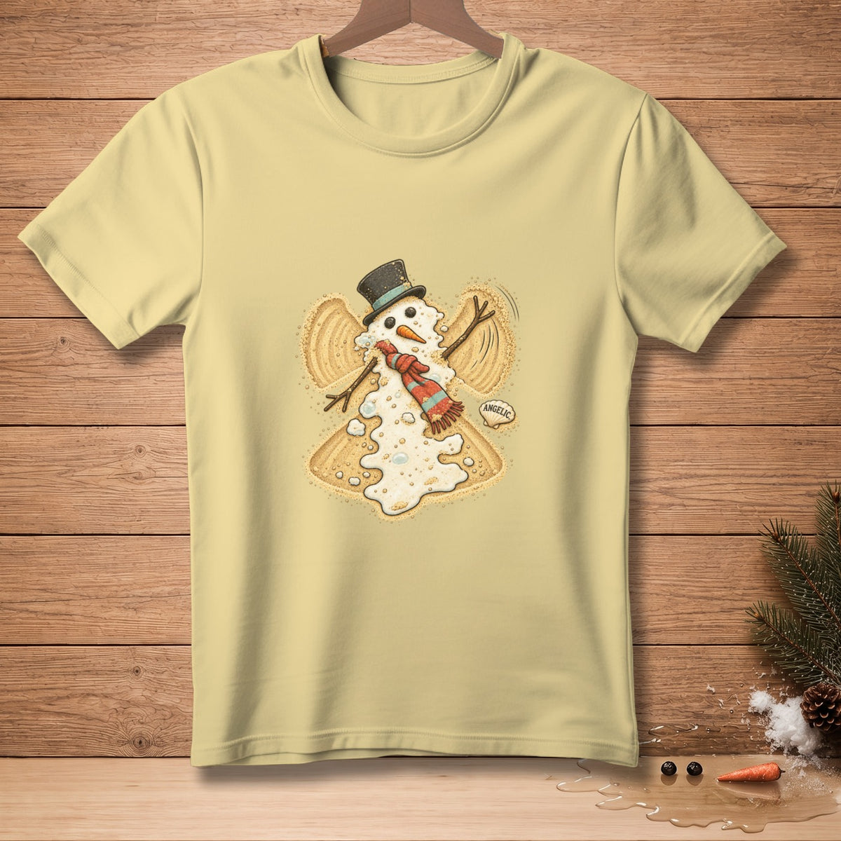 Light yellow t-shirt with a melting snowman angel graphic and the word "ANGELIC".