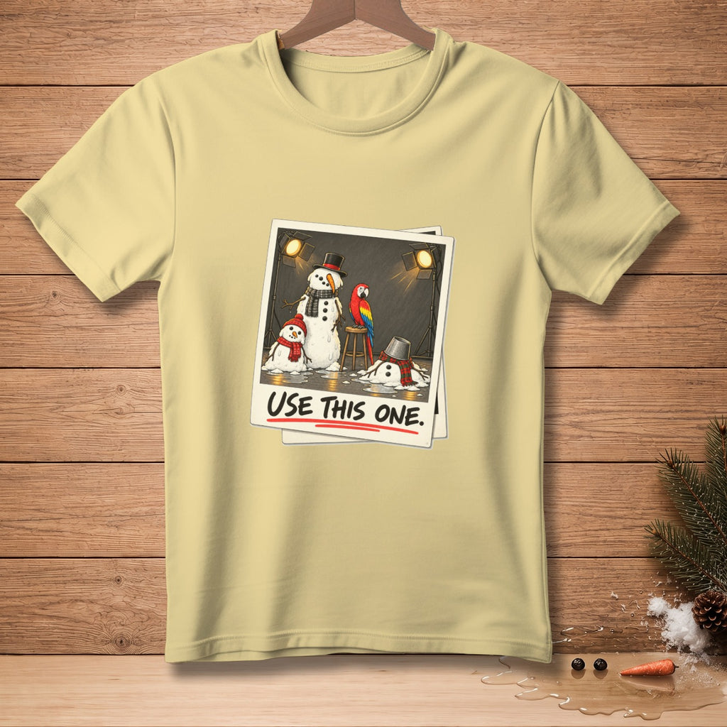 Yellow t-shirt featuring snowmen, a parrot, and the text "USE THIS ONE."