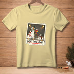 Yellow t-shirt featuring snowmen, a parrot, and the text "USE THIS ONE."
