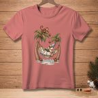 T-shirt graphic of a snowman reading in a hammock between palm trees while a monkey drops coconuts.