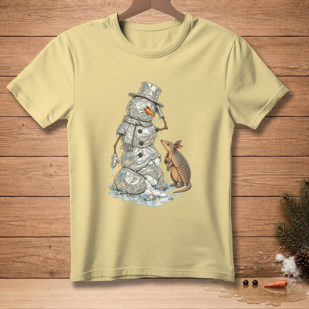 Snowman with hat and scarf melts beside an armadillo.