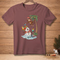 Snowman holding cocktails with monkey by palm tree on maroon t-shirt.