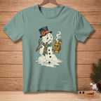 Melting snowman in a top hat holding a hot toddy with a sunny face.