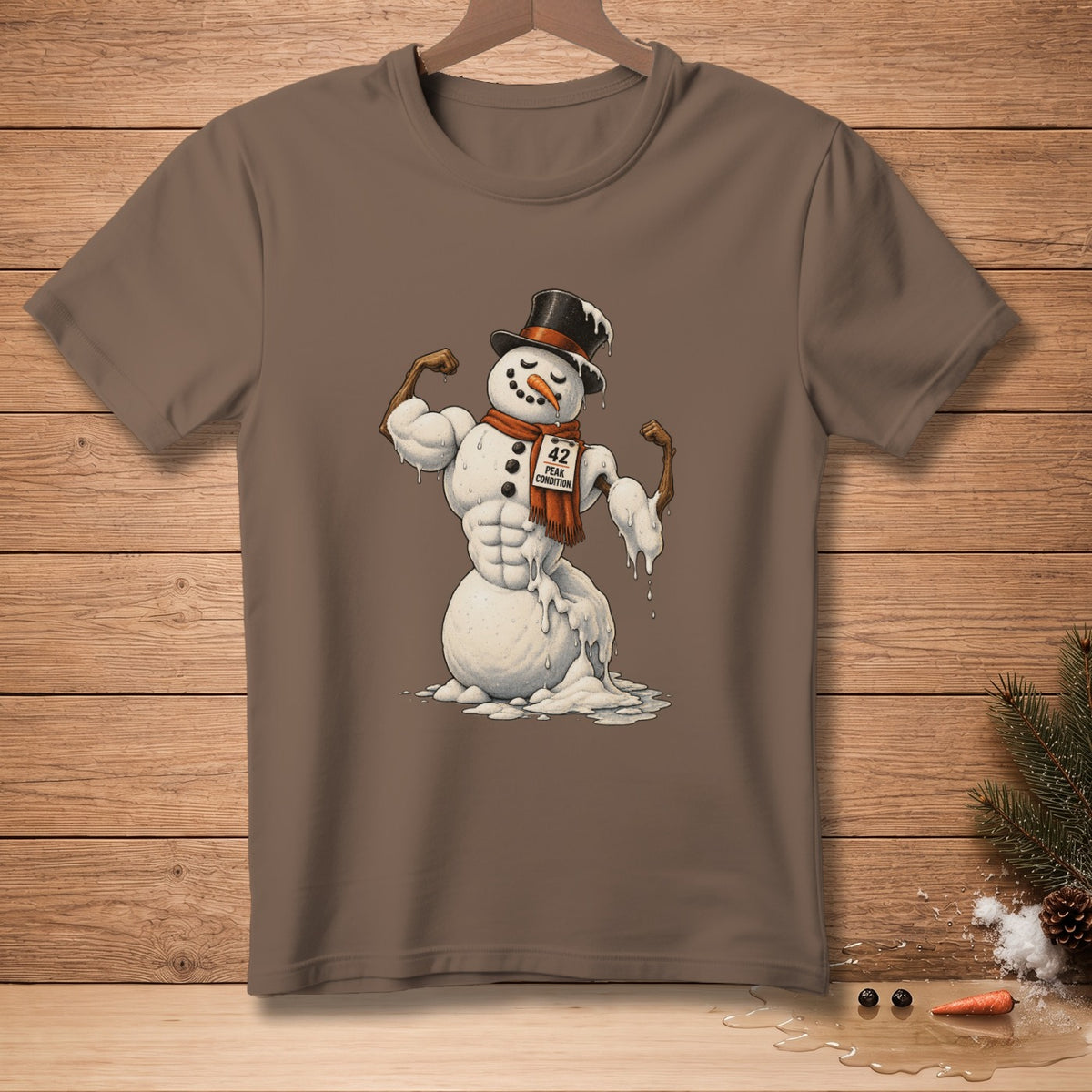 Muscle-bound snowman flexing, wearing a top hat and scarf with "42 Peak Condition" tag.