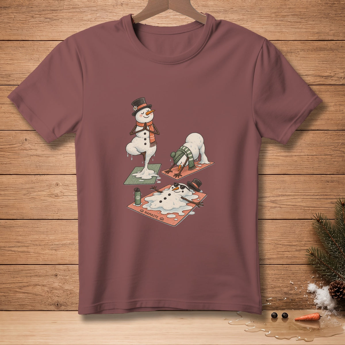 T-shirt with melting snowmen doing yoga poses on mats.