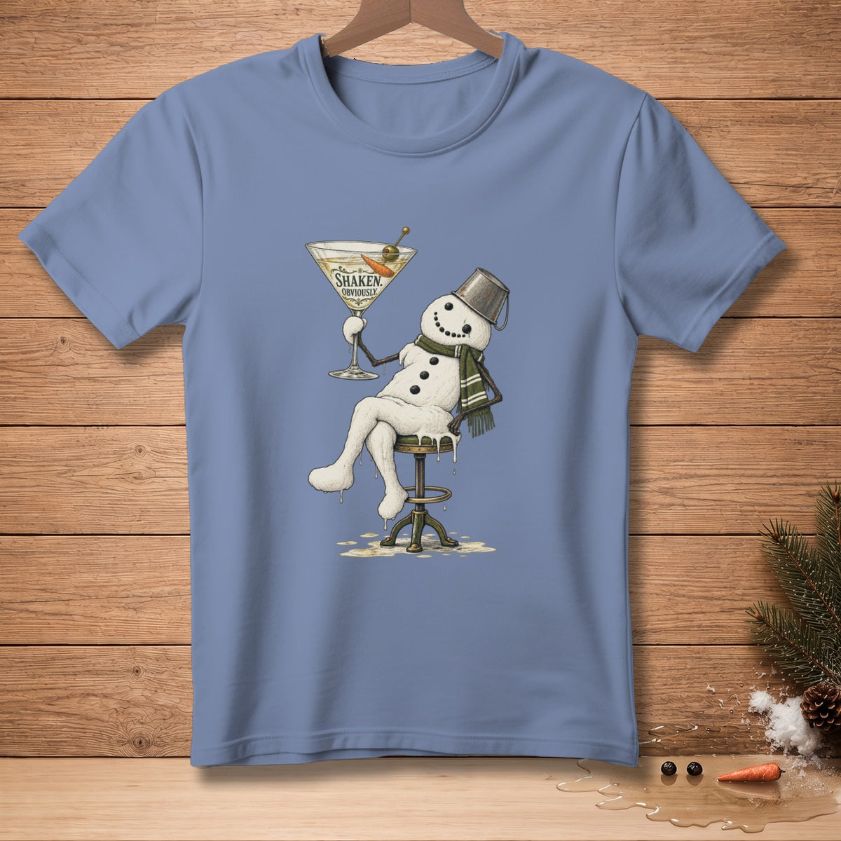 Snowman in scarf holding martini glass with text "SHAKEN OBVIOUSLY"