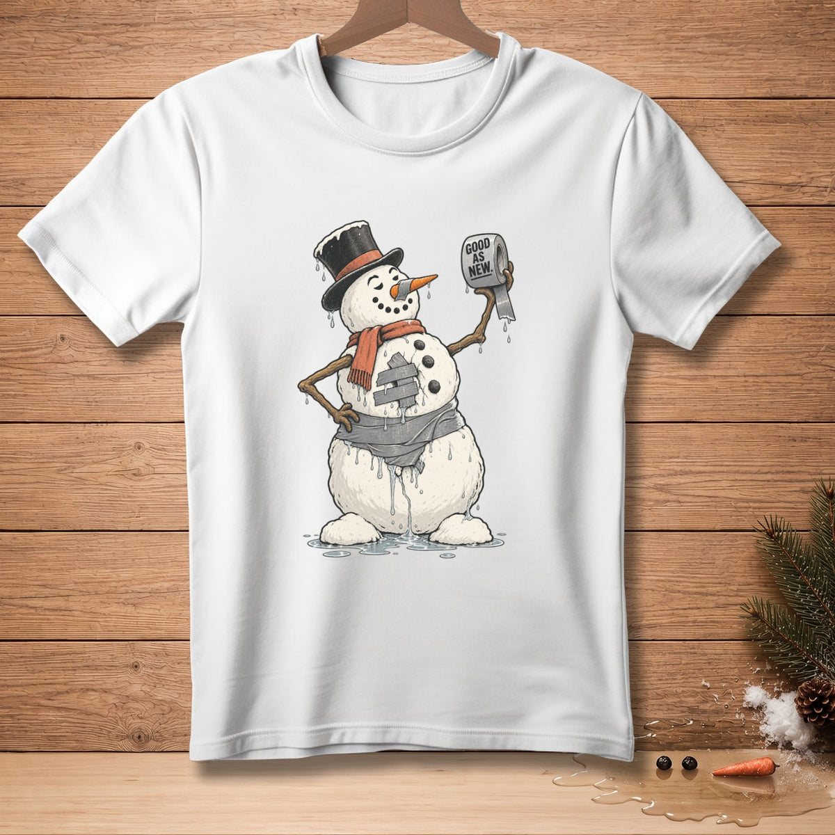 White t-shirt with melting snowman wearing a hat and scarf, holding toilet paper.