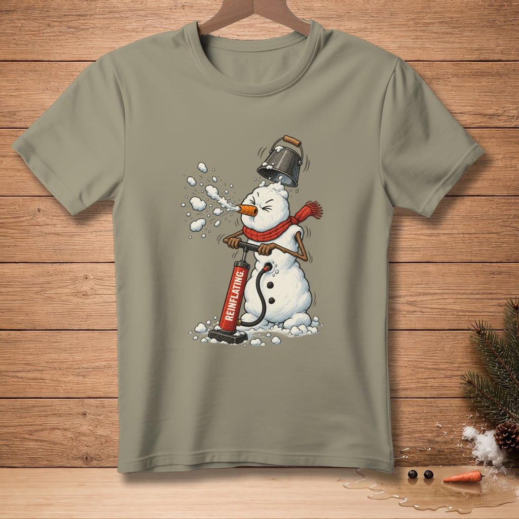 Snowman with bucket hat and red scarf using air pump labeled "REINFLATING."