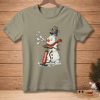 Snowman with bucket hat and red scarf using air pump labeled "REINFLATING."
