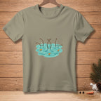 T-shirt with graphic of melting snowmen's arms and carrot noses in water.